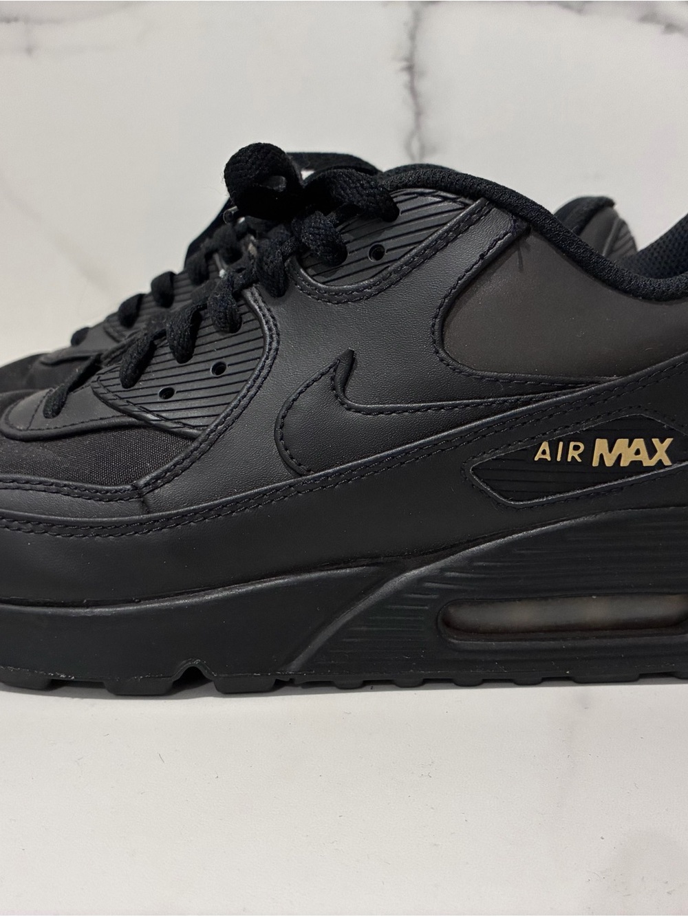 Nike Air Max Men's Sneaker in Black with Gold Accent